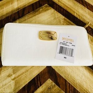 Brand New MK  wallet with Gold Emblem